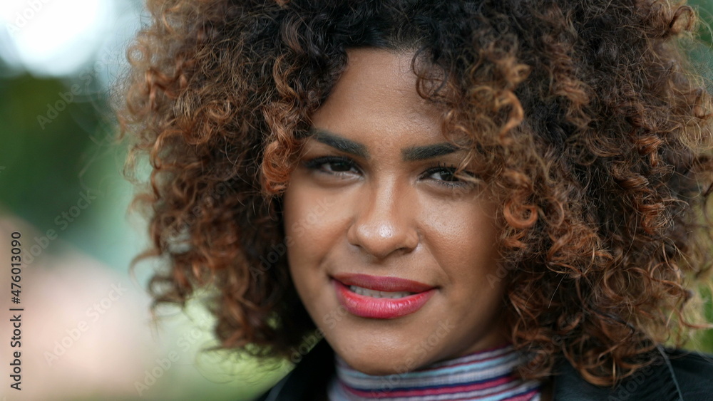 happy black African woman with curly hair nodding yes agreeing happy black African woman with curly hair nodding yes agreeing