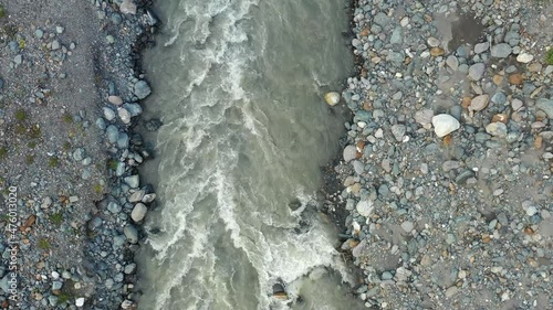 movement along the course of a mountain river and rocky banks