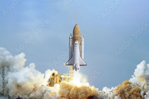 Spaceship takes off into the sky. Rocket starts into space. Concept “Elements furnished by NASA”
