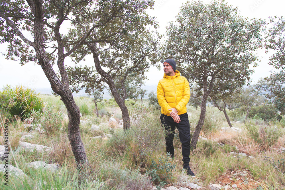 Middle-aged person doing activity in nature to achieve objectives. Middle-aged person doing activity in nature to achieve objectives.