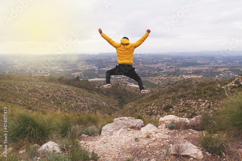 Middle-aged person doing activity in nature to achieve objectives.