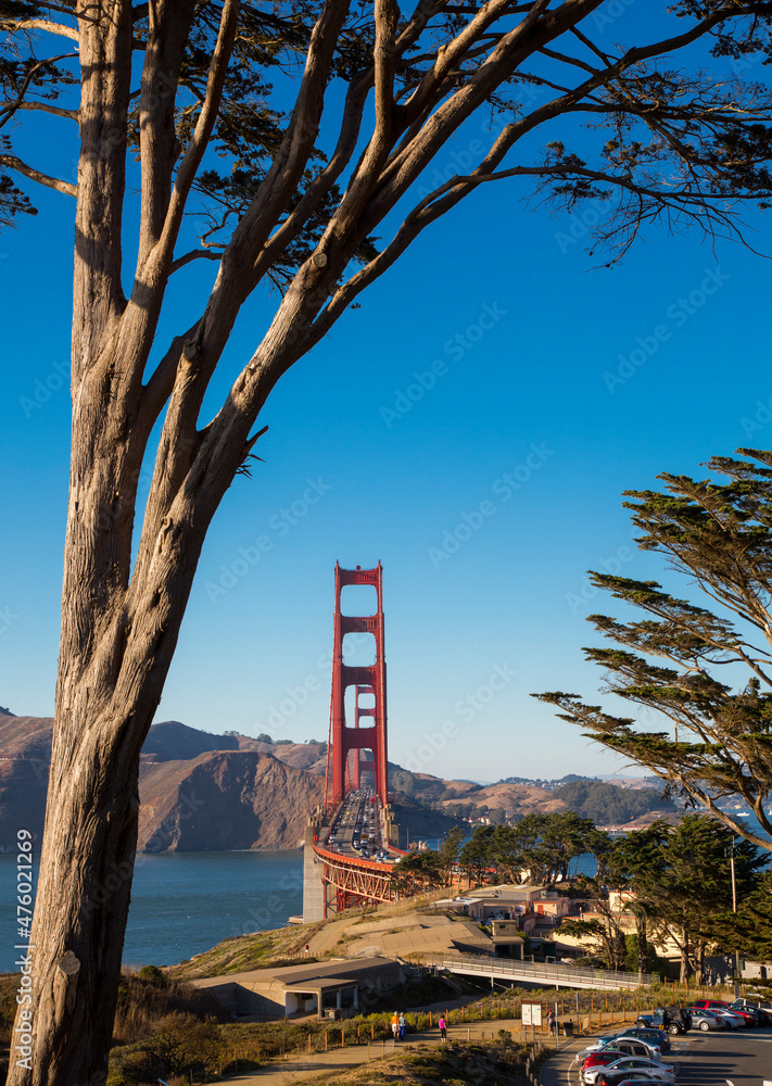 Golden Gate Bridge against the blue sky and mountains Golden Gate Bridge against the blue sky and mountains