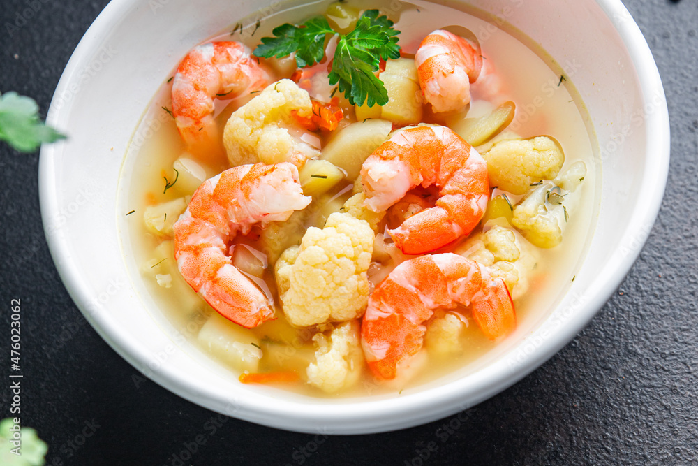 soup seafood shrimp vegetable  healthy meal diet snack on the table copy space food background rustic 