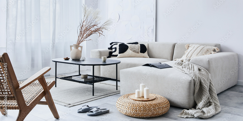 Domestic interior of living room with design modular sofa, black coffee  table, lamp, decoration, art paintings, pouf, widnows and elegant personal  accessories in modern home decor. Template. foto de Stock | Adobe
