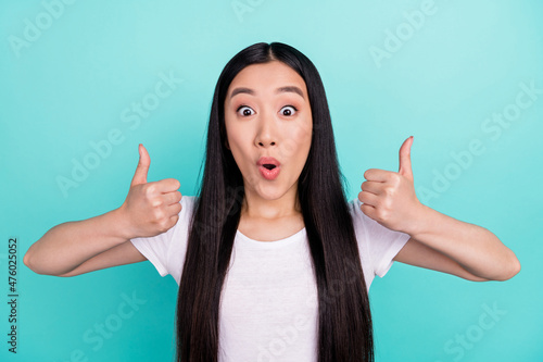 Slika na platnu Photo of young attractive asian girl amazed shocked happy smile show thumbs-up l
