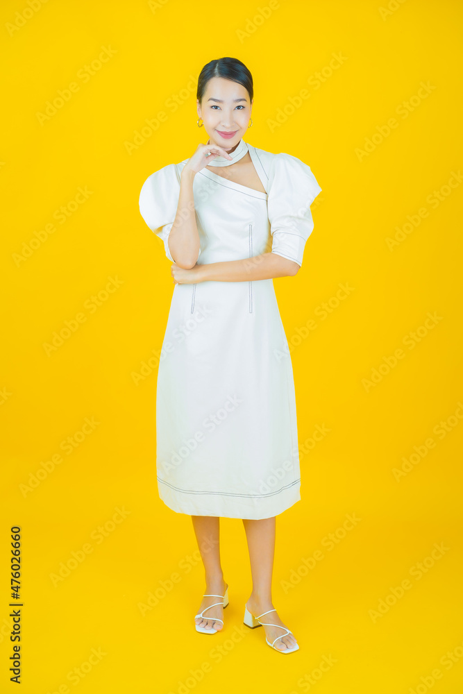 Portrait beautiful young asian woman smile with action Portrait beautiful young asian woman smile with action
