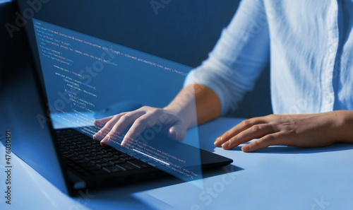 Software developer working at programming code script on virtual digital screen.Development and coding technology concept. IT coding and new technology revolution. 