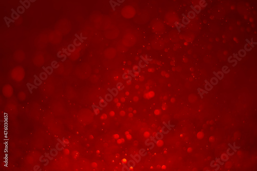 Red glitter vintage lights background. White bokeh on red background. Red heart boked
