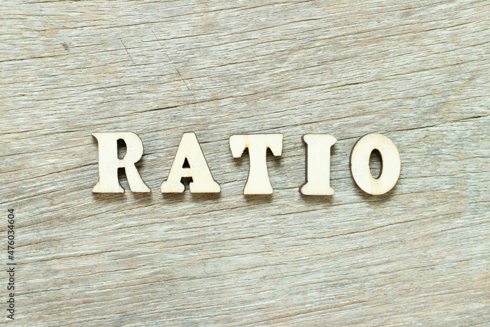 Alphabet letter in word ratio on wood background
