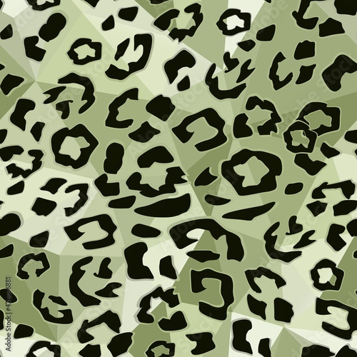 Seamless leopard print. Black spots on a green background.