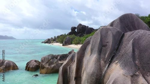Drone clip on the beautiful island of La Digue in the Seychelles on the dream beach of Anse Source d'Argent  photo