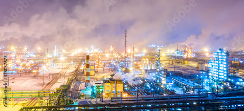 Fototapeta Naklejka Na Ścianę i Meble -  Aerial drone view of petrol industrial zone or oil refinery in Yaroslavl, Russia during winter at night.
