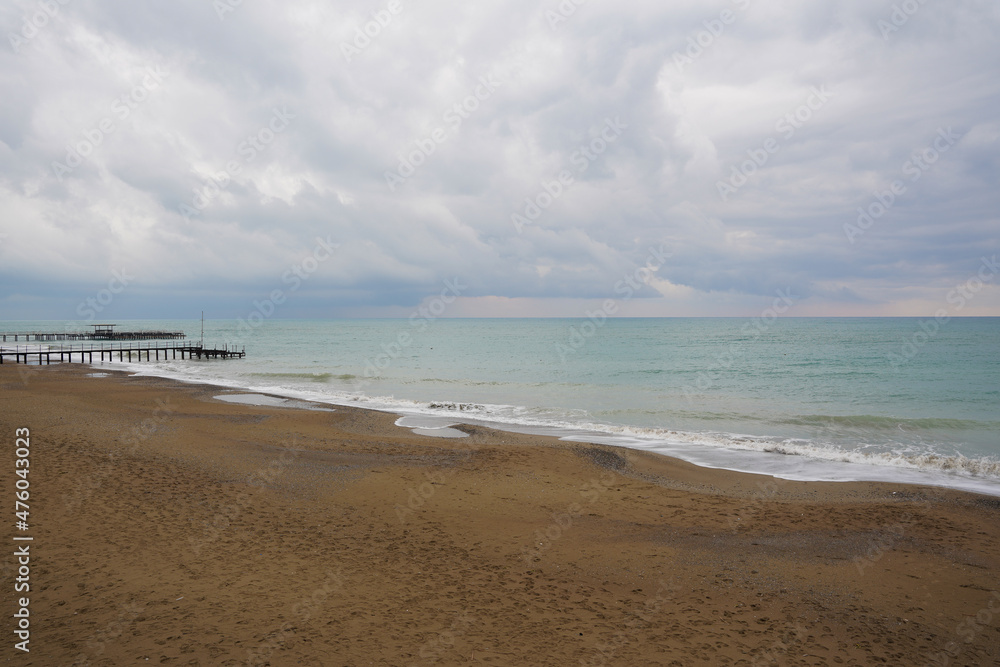 Waves, Clouds and Pier on the Great Beach