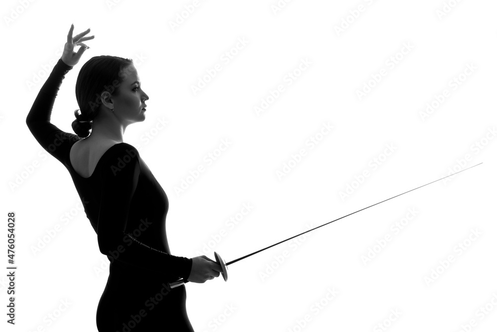 Fototapeta premium Silhouette of a young woman with a sword in her hand on an isolated background.