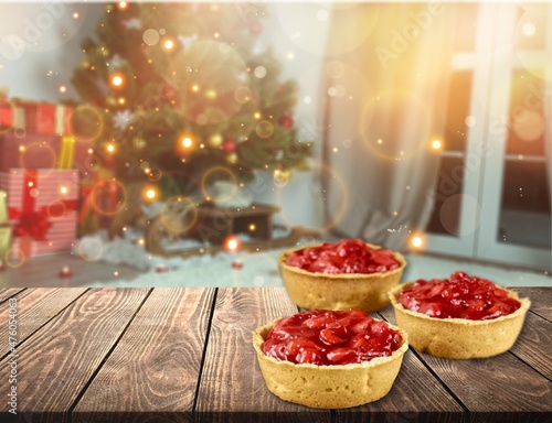 Slika na platnu Portion pastries with cream and sauce in New Year's or Christmas decor
