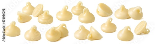 Milk chocolate drops or chips set isolated on white background. Sweet details. Package design element with clipping path. Full depth of field
