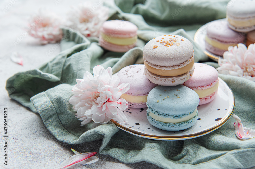 Beautiful colorful tasty macaroons on a concrete background Beautiful colorful tasty macaroons on a concrete background
