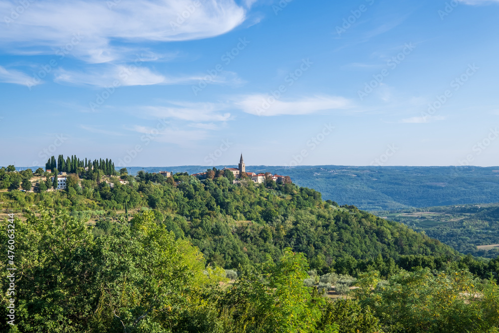 View of the green hills and colorful houses of the medieval town of Groznjan, Istria, Croatia.View of the green hills and colourful houses of the medieval town of Groznjan, Istria, Croatia.