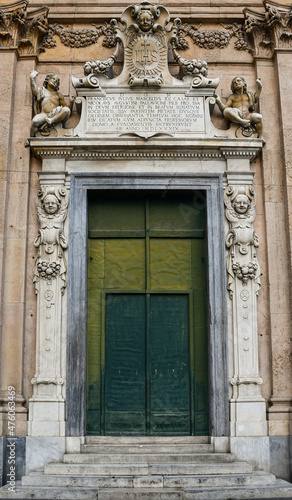 Portal of the Church of Jesus (Chiesa del Gesù, 16th century), with bas-reliefs and marble sculptures in Baroque style, in the center of the coastal town, Genoa, Liguria, Italy © Simona Sirio