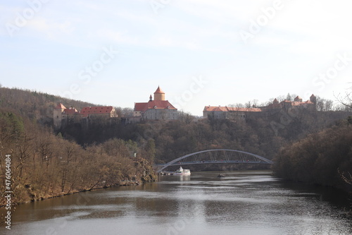 A view to the Veveri castle above the river and boat in front near Brno, Czech republic  photo