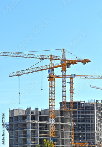 Crane and highrise construction site