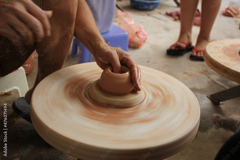 Fototapeta premium hands of a potter