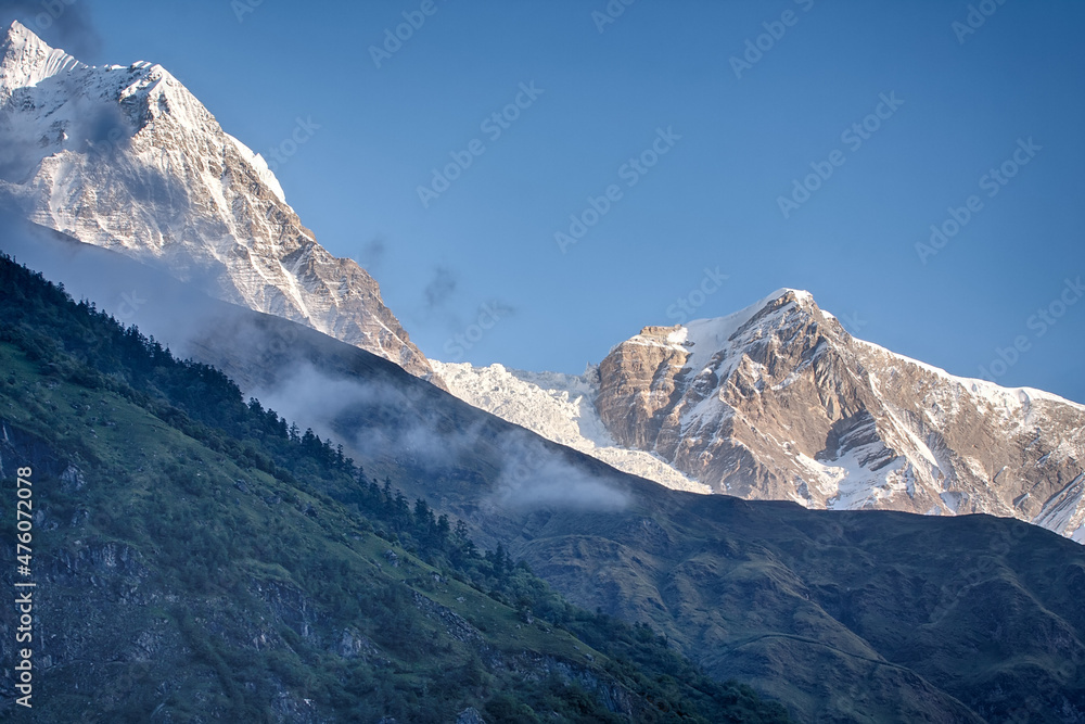 Dhaulagiri icefall in early morning shot from Kalopani village, Nepal