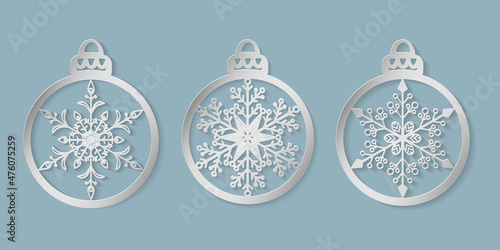 Christmas balls with pattern snowflake cut out of paper. Templates for laser or plotter cutting, printing. Great for Christmas cards, envelopes, invitations, interior elements. Die cut card. Vector