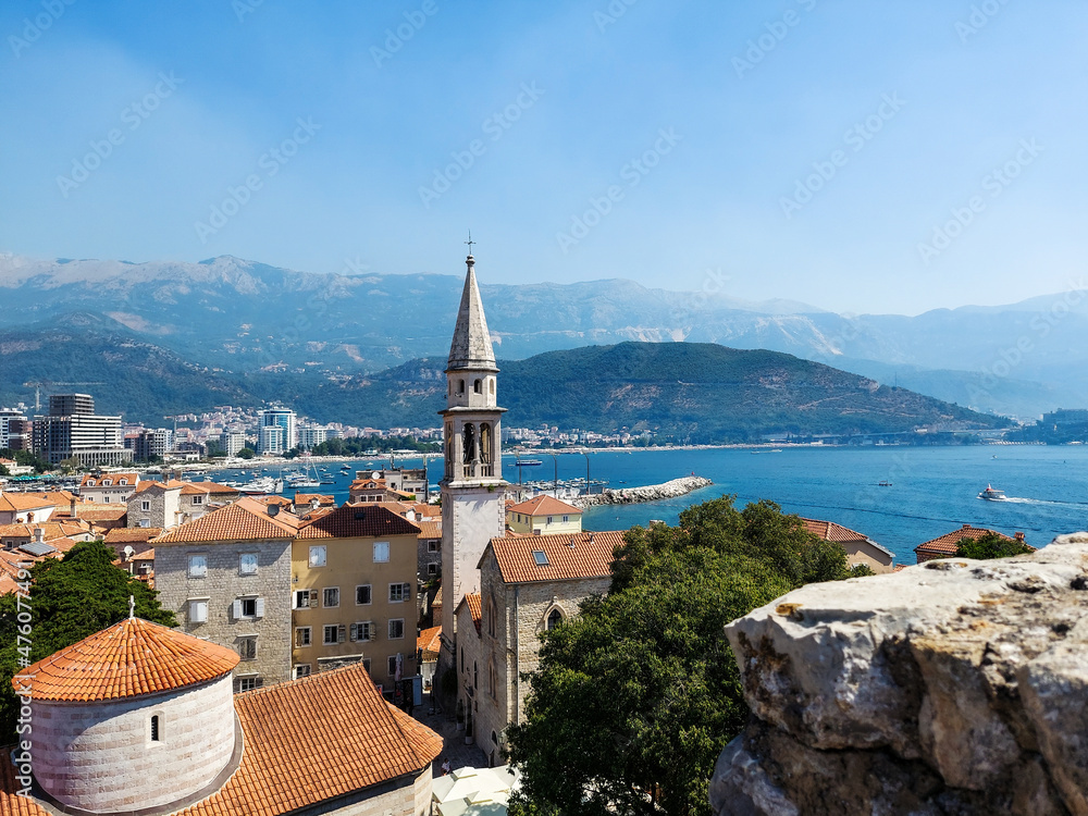 Panoramic cityscape of The Old Town of Budva, Montenegro, beautiful top view of Adriatic Sea and the Balkan Mountains
