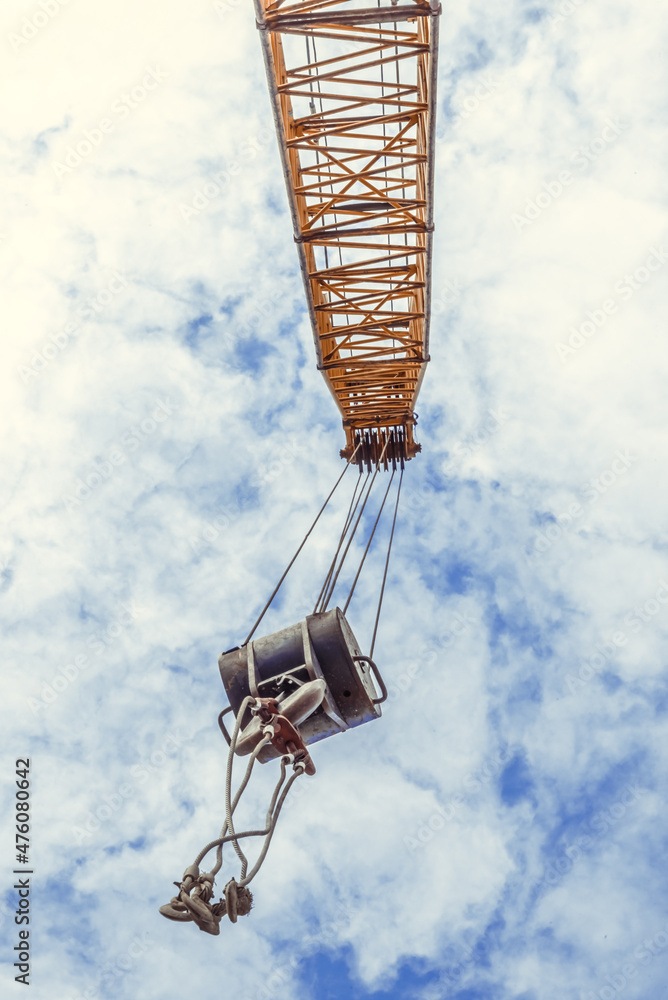 construction crane with a blue sky background