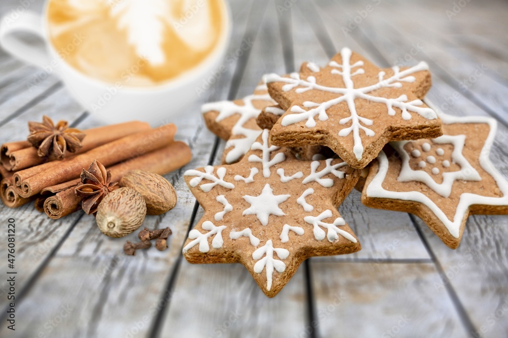 Cinnamon stars, traditional Christmas cookies, gingerbread on the desk Cinnamon stars, traditional Christmas cookies, gingerbread on the desk