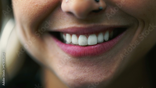 Casual woman mouth wide smile approving macro close-up smiling