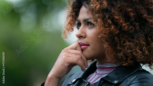 Black woman pondering solution to problem. Brazilian girl thinking contemplating solution