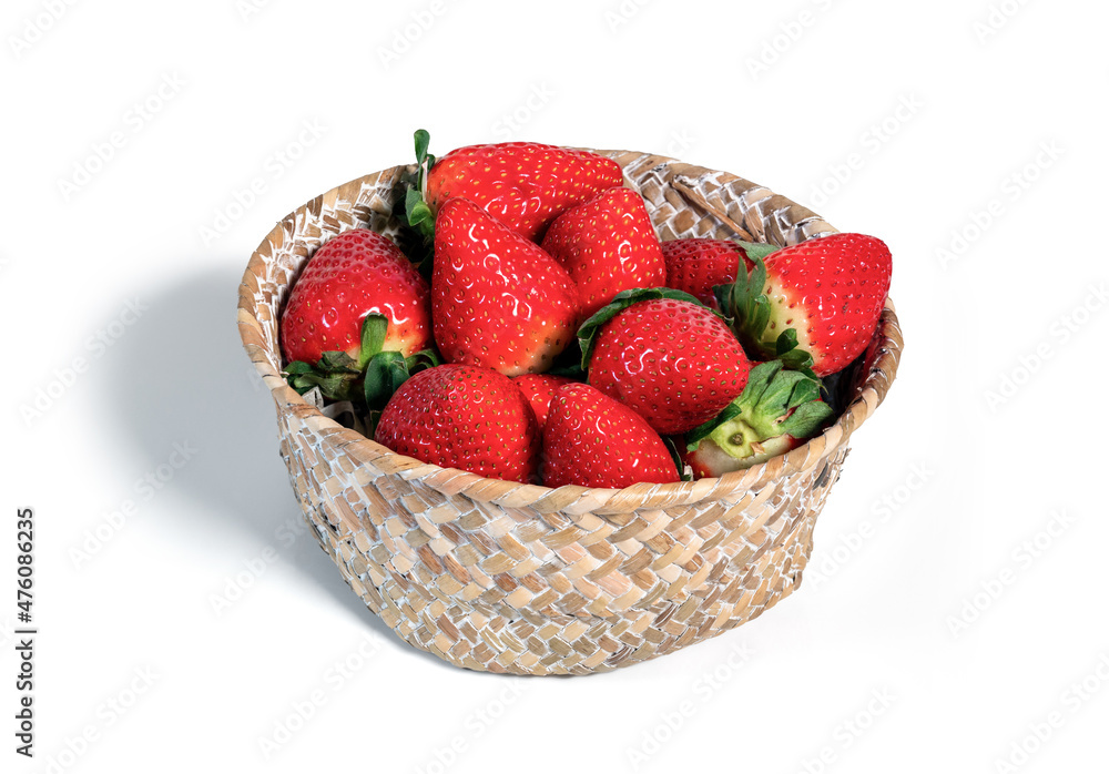 Fresh strawberries in wicker basket isolated from the white background Fresh strawberries in wicker basket isolated from the white background