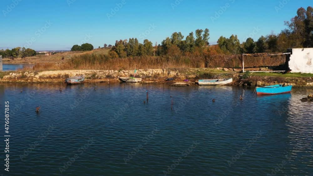 Stationary boats near a small pier in the Mar Piccolo, Taranto
Stationary boats near a small pier in the Mar Piccolo, Taranto
