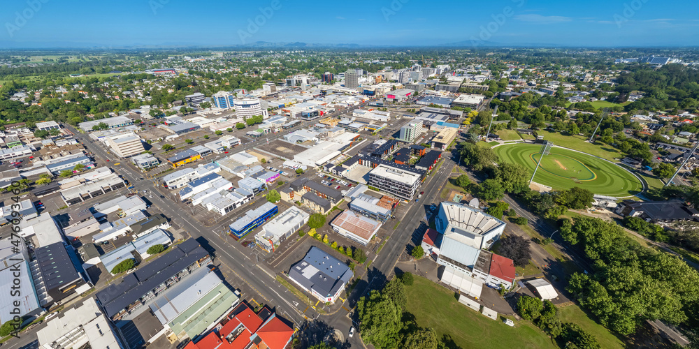 Fototapeta premium Aerial drone panoramic view, looking over the CBD, Founders Theatre & Seddon Park, over the city of Hamilton (Kirikiriroa) in the Waikato region of New Zealand.