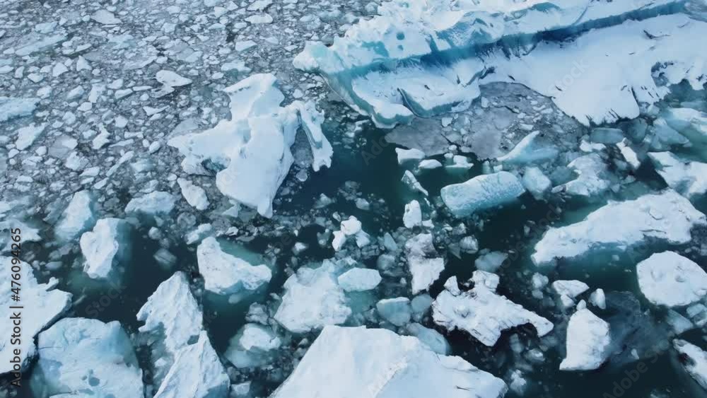 Iceland Melting Blue Water Iceberg Aerial View. Climate Change Global Warming problem. Iceland Melting Blue Water Iceberg Aerial View. Climate Change Global Warming problem.