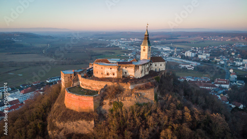 Photos Aerial view of Burg Güssing in Burgenland, Austria in a beautiful winter evening sunset mood