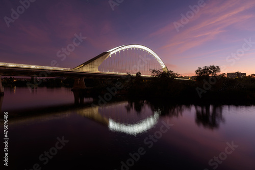 Lusitania bridge a modern style building over Guadiana river in a colorful sunset, Merida, UNESCO World Heritage Site, Extremadura, Spain