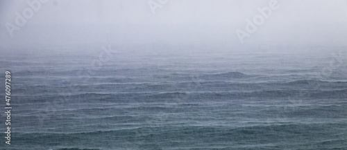 Obraz na plátně Sea mist over the calm water surface