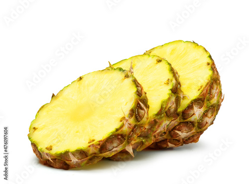 Ripe juicy pineapple slices isolated on a white background. Fresh fruits.