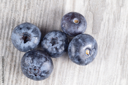 Blueberries on white wooden background