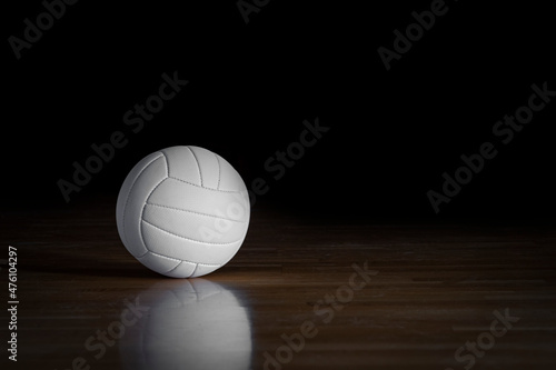 Volleyball ball on wooden court. Horizontal education and sport poster, greeting cards, headers, website