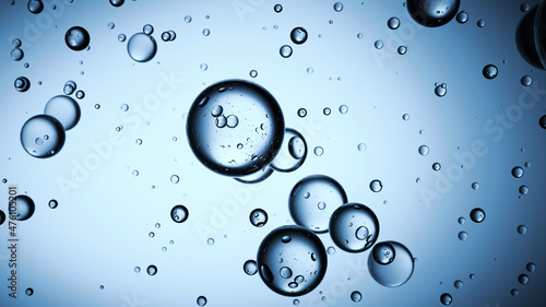 Bubbles flow in blue copy space background
