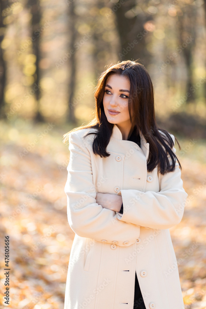 Young woman in beautiful autumn park, concept autumn Young woman in beautiful autumn park, concept autumn