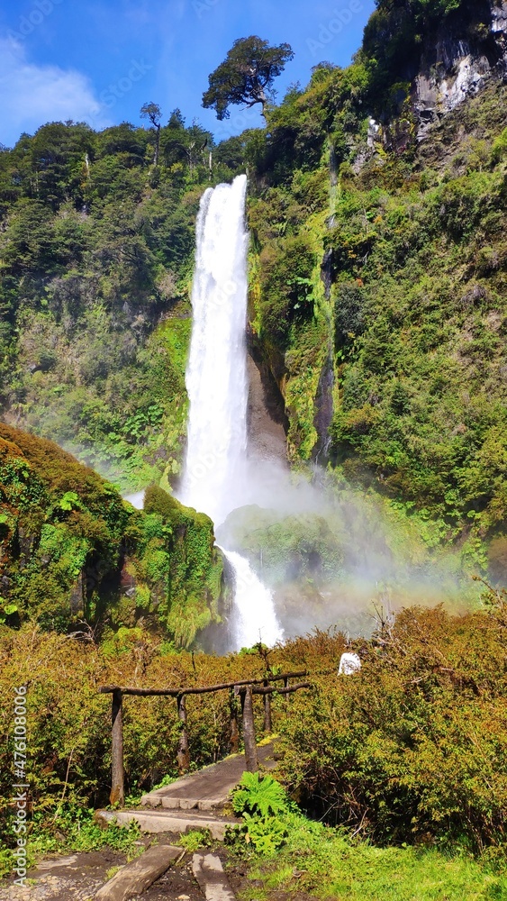 Scenic view of Salto El Leon waterfall and green vegetation, Pucon, Chile.