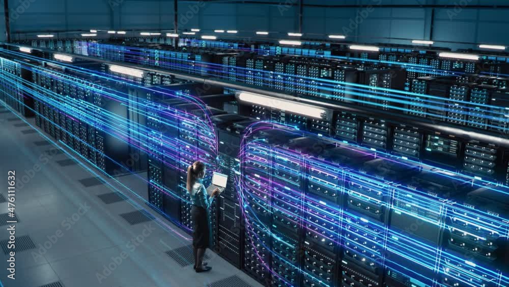 Animated Concept: Big Data Center Female Chief Technology Officer Using Laptop Standing In Warehouse, Activates Servers, Information Digitalization Starts. SAAS, Cloud Computing, Web Service