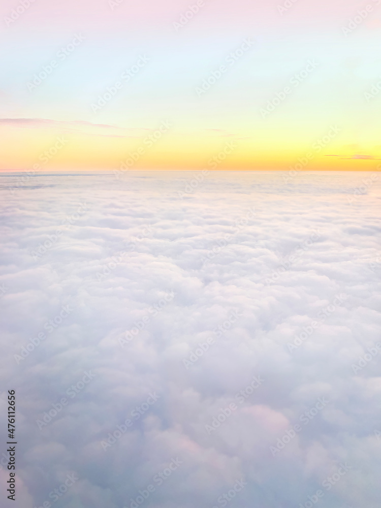 Clouds and sky background, bird's eye view at sunset, dawn, beautiful atmospheric pastel background Clouds and sky background, bird's eye view at sunset, dawn, beautiful atmospheric pastel background