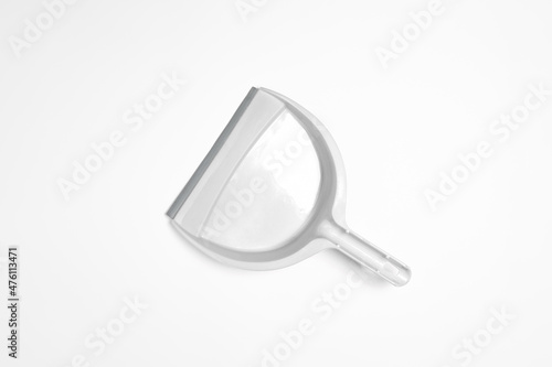 Plastic dustpan garbage isolated on white background. High-resolution photo.Top view. Mock-up.