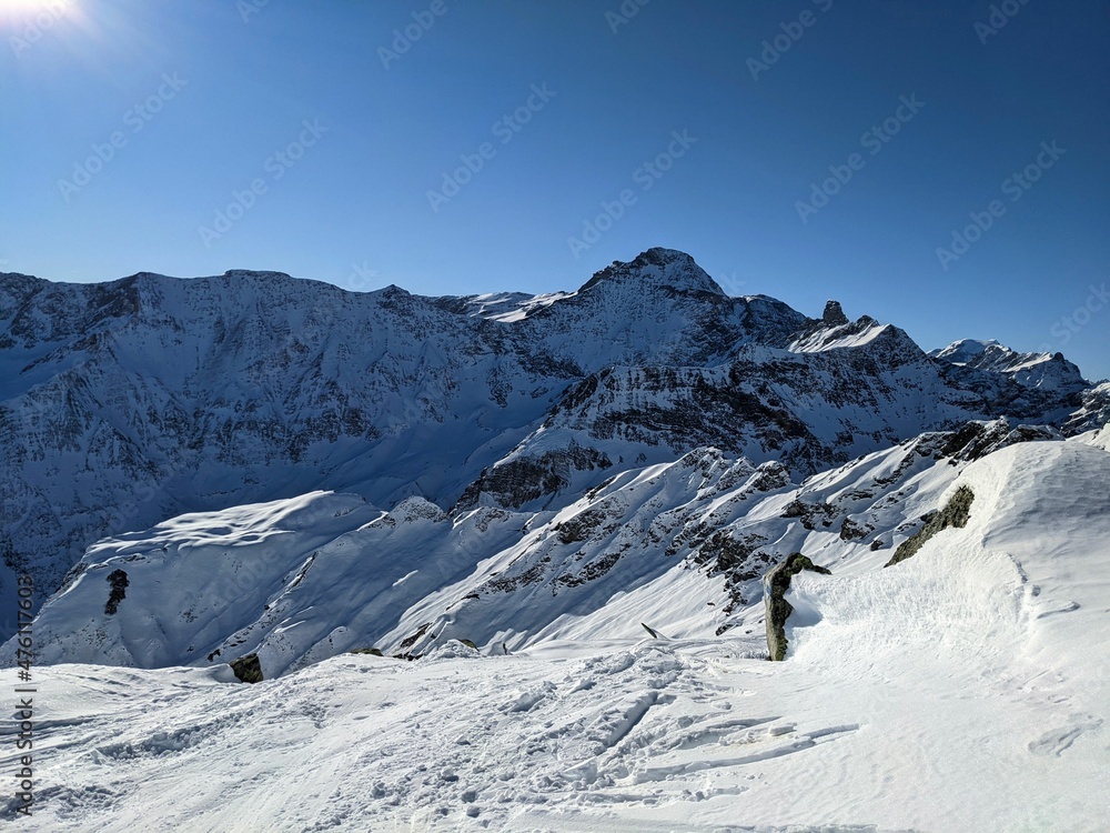 Ski tour on the charpf above elm glarus. Skimo. Mountaineering in winter. Beautiful snowy mountain landscape. Ski track